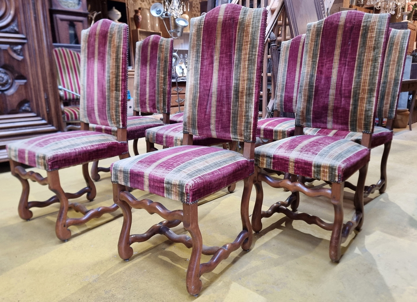A set of 8 French Regence Dining Chairs